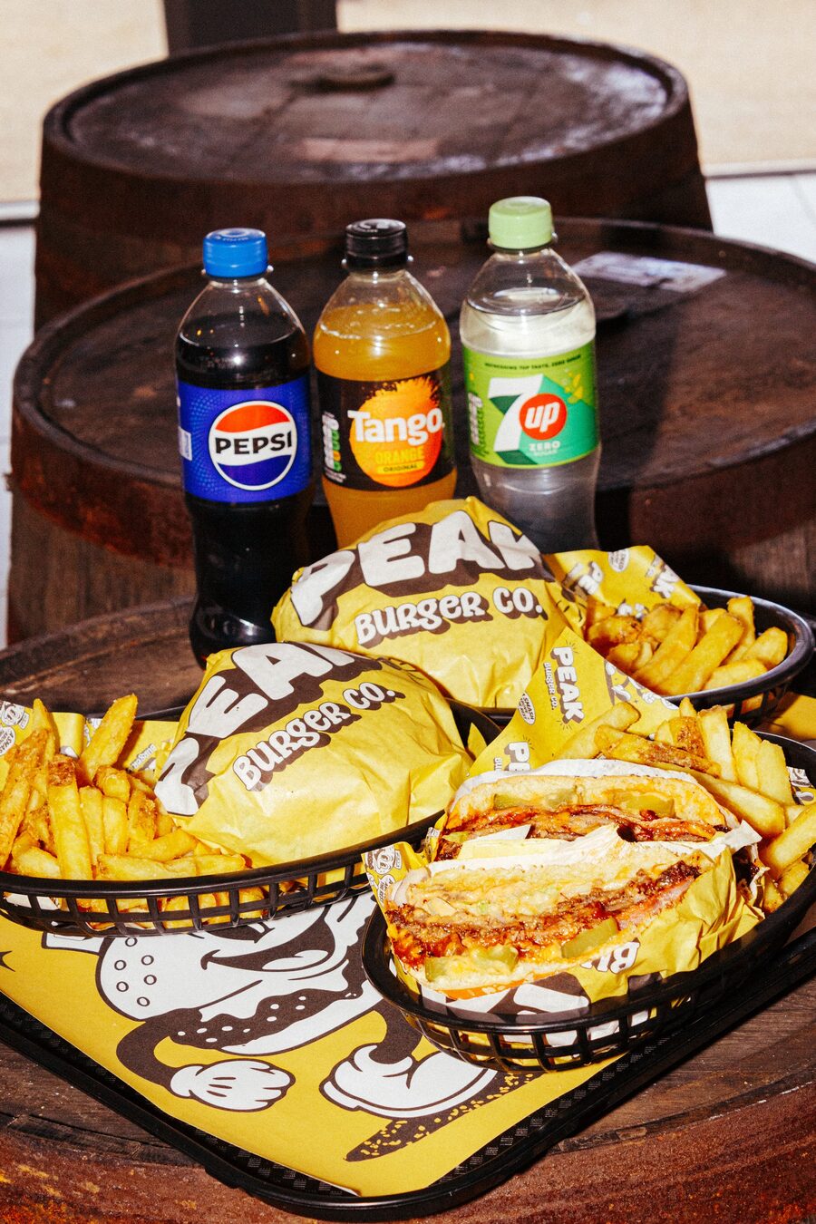 Peak Burger Co meal with burgers, fries and a choice of soft drinks